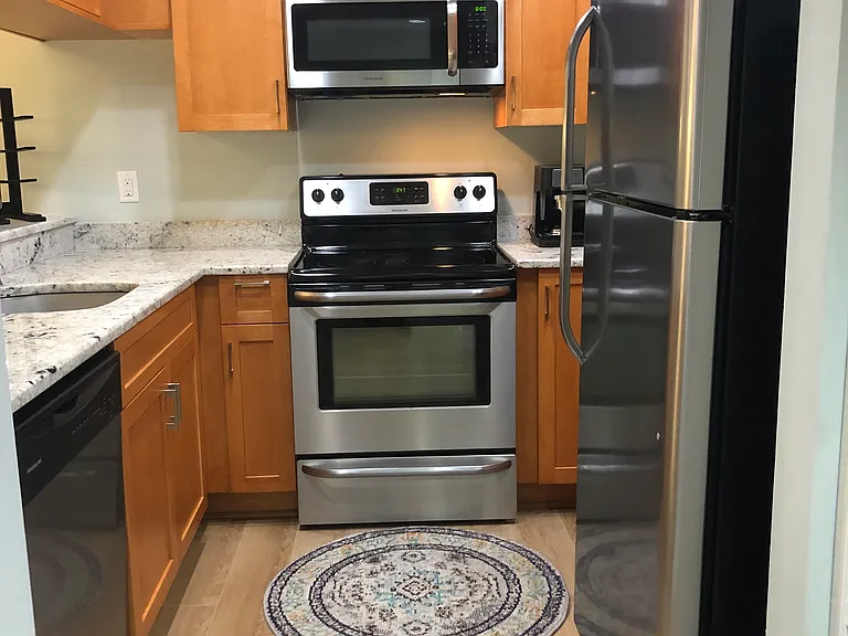 Kitchen with solid Maple Cabinetry, Stainless Steel Appliances