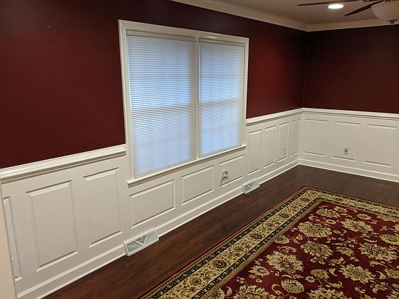 Formal Living Room with custom wainscoting.