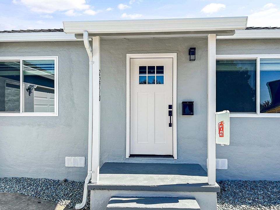 Front door entrance with modern LED lights