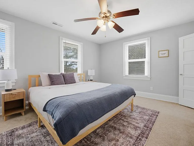 Bedroom 3: Plenty of storage and light in this room with a queen size bed.