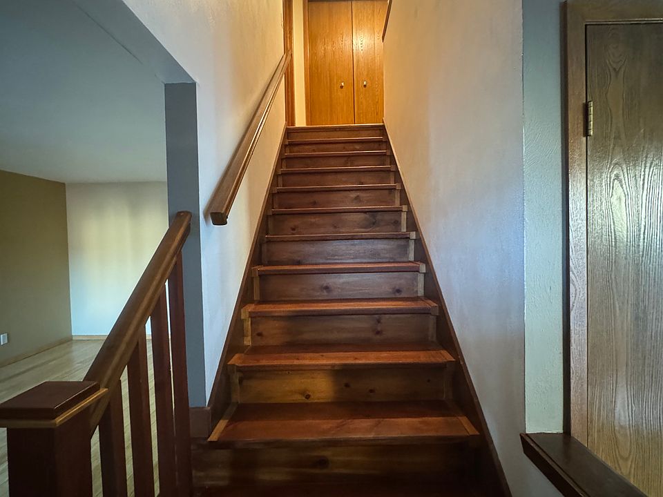 Staircase seen as you open the front door