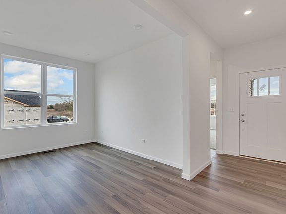 View of Foyer with Adjacent Flex Room and Secondary Bedroom