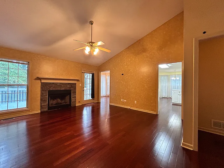 Living room to kitchen and to dining room