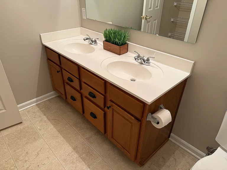 Double sinks in master bathroom.
