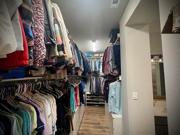 Oversized closet with double hanging racks