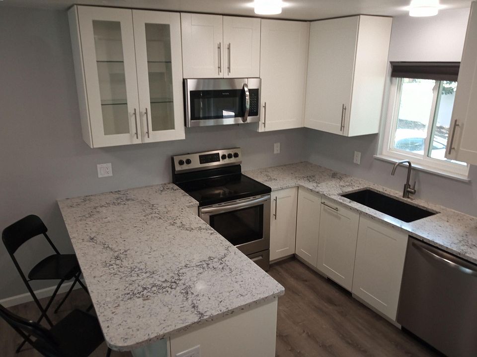 New IKea Kitchen, quartz countertops, lazy suzane, enormous storage, SS appliances, Large capacity dishwasher, counter chairs, display cabinet