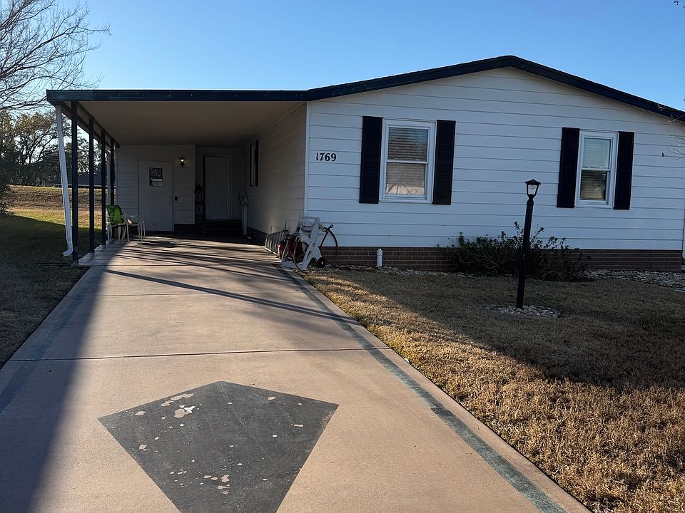 Carport and exterior of home