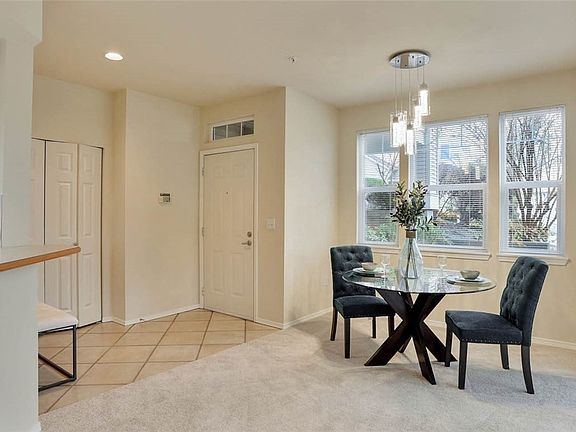 Tile entry with large coat closet.  Makes it easy to keep your carpet clean.