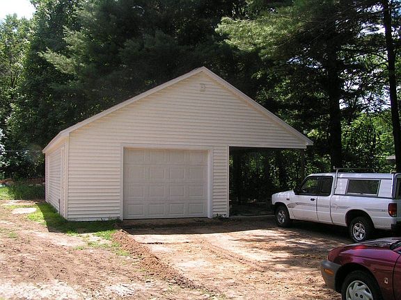 Garage and carport (pre-driveway paving)