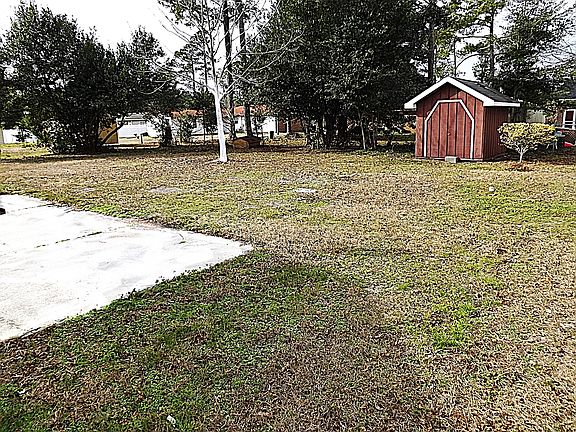 Large Back Yard With Storage