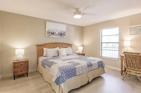 Room 1
King-size bed, air conditioning, bed sheets, ceiling fan, space to store clothes, essential services, extra pillows and blankets, clothes hooks, heating, iron, TV.