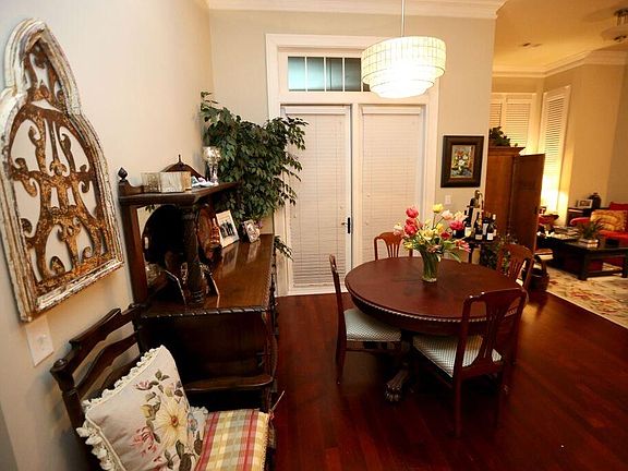Dining area with French doors opens to covered porch facing