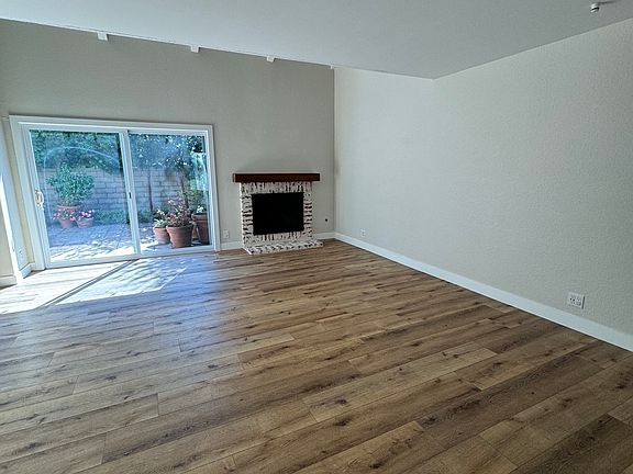 Living room, vinyl plank flooring throughout downstairs