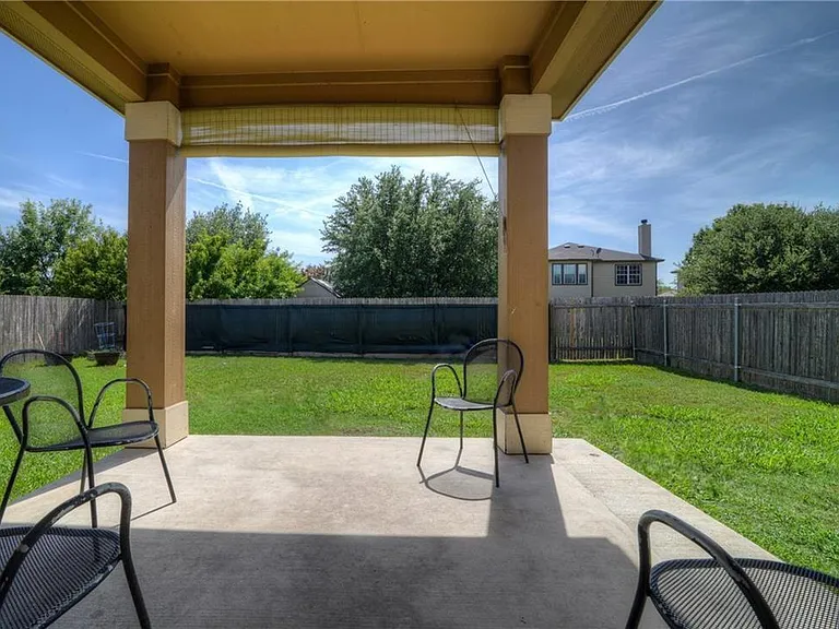 Large backyard and back patio