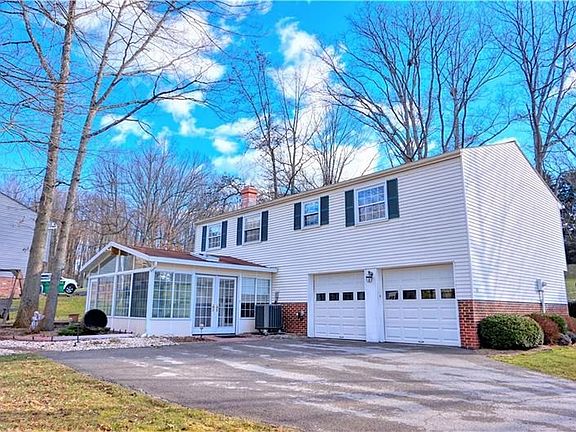 A four seasons room and 2 stall garage!
