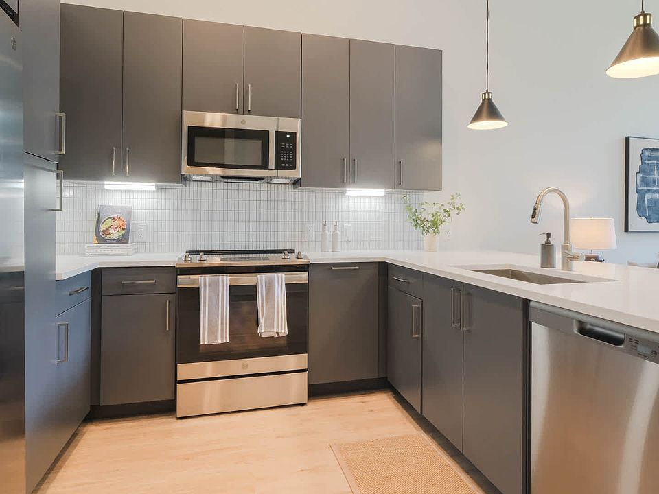 Kitchen with Stainless Steel Appliances and Dark Cabinets