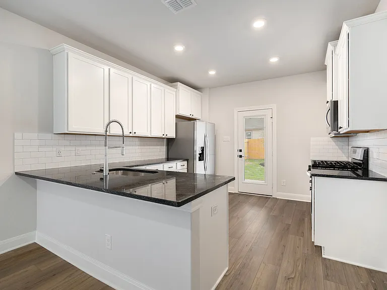 All kitchen appliances come included.