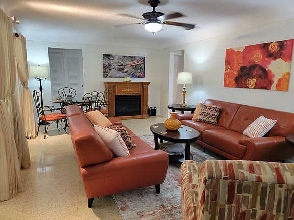 Catch up on the day or week with friends and family. This large living room has space for dining too! Make it your own. Great place to gather and create memories.