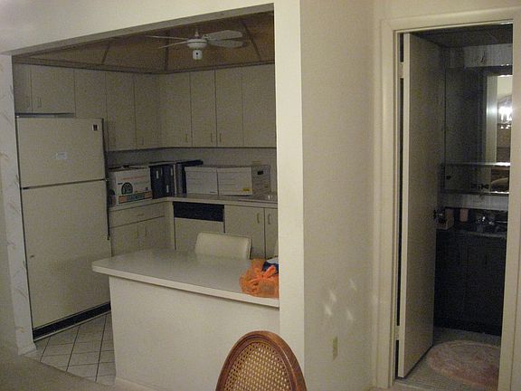 Kitchen/Entrance to half-bath
