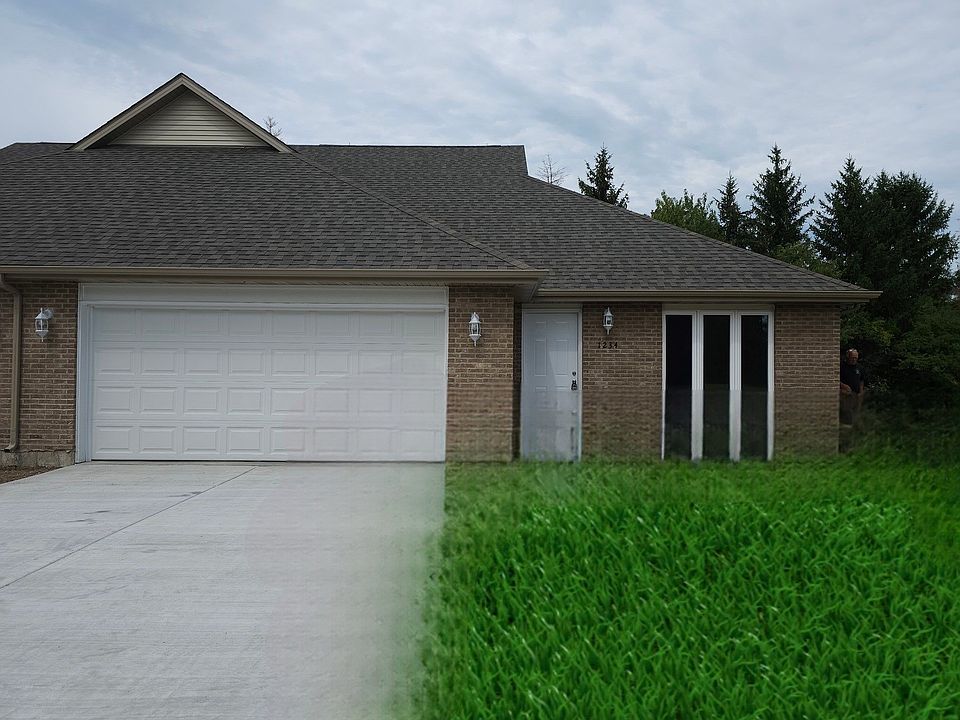 Staged to include sod. Builder is adding, just not