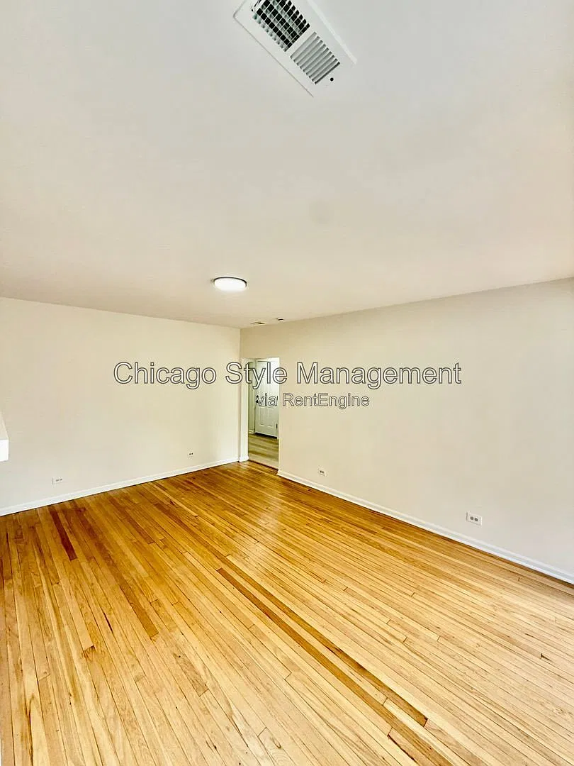 7833 S Colfax Ave — Photo 1