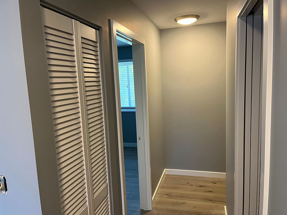 hallway to bedroom, bathroom