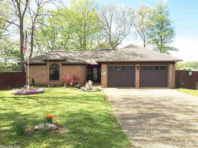 Front of the house
						:
						2 car attached garage Flag Pole all of the flower beds are recently mulched