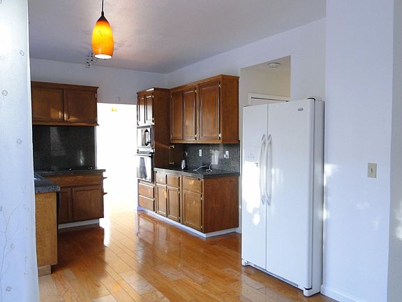 Open-floor kitchen connected to family room