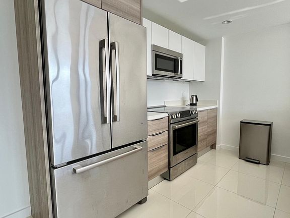 3rd image of 9940 W Bay Harbor Dr Unit 5AS