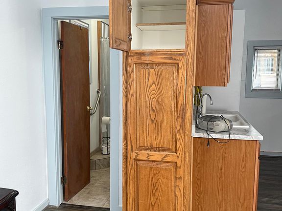 Linen closet and bathroom entrance