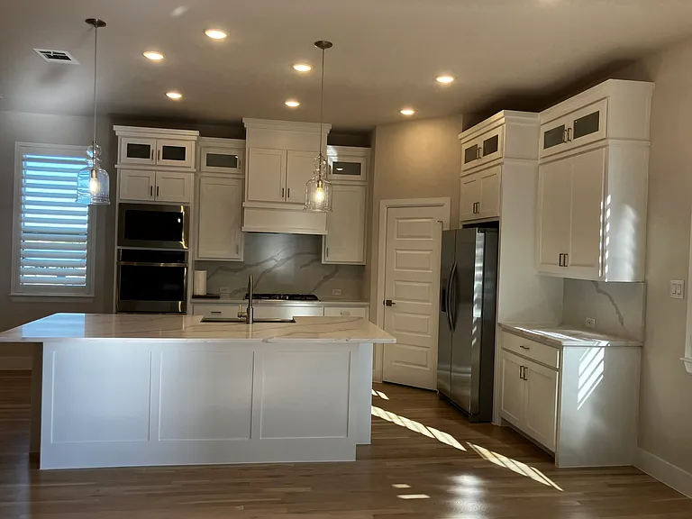 spacious kitchen with new appliances and loads of cabinet storage