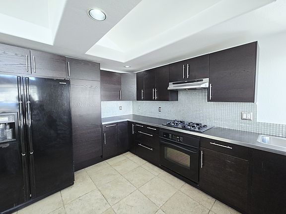 5th image of 8528 W Gilmore Ave