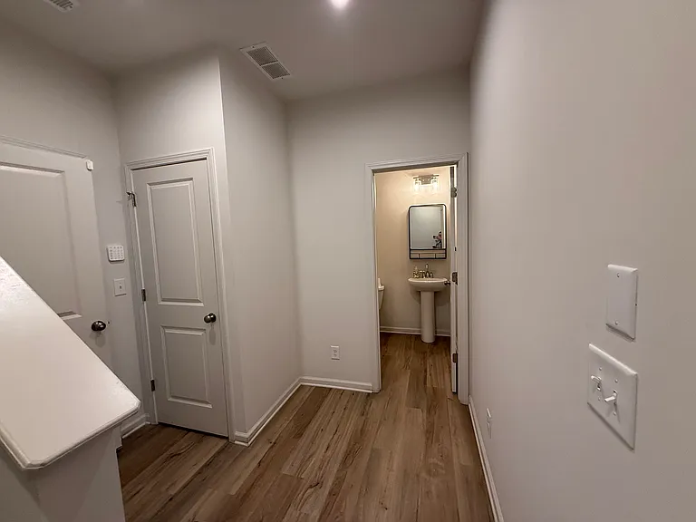 Garage level landing, half bathroom