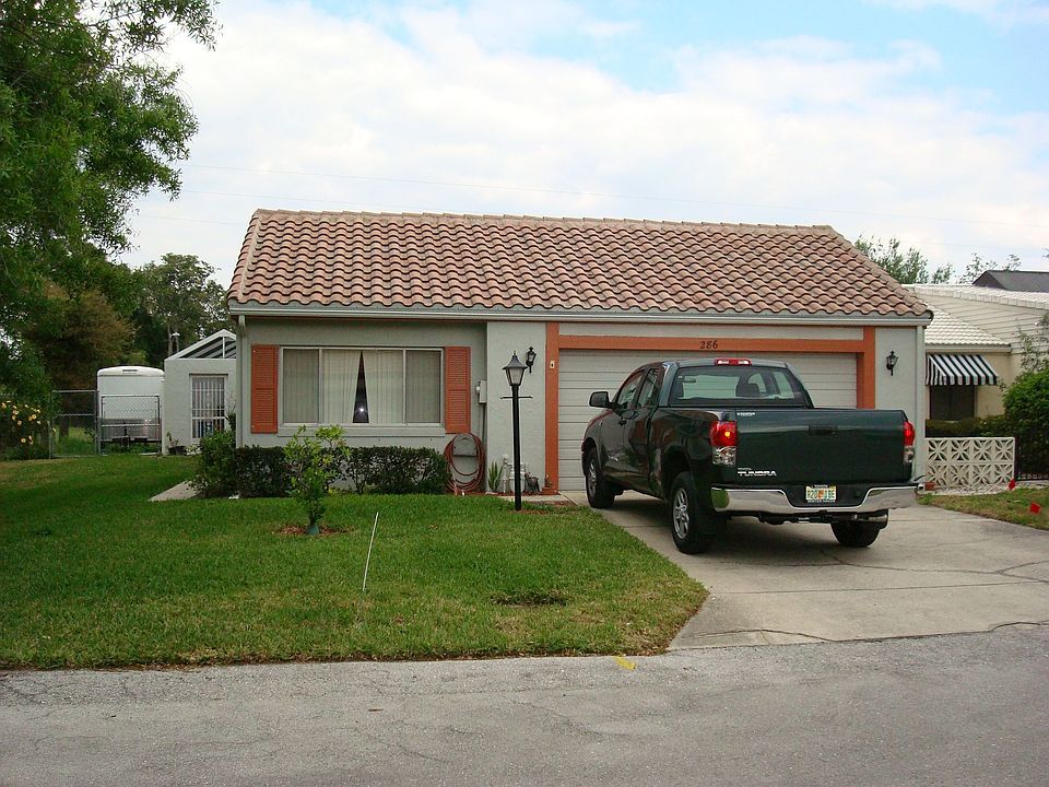 From street also shows dog run at left rear