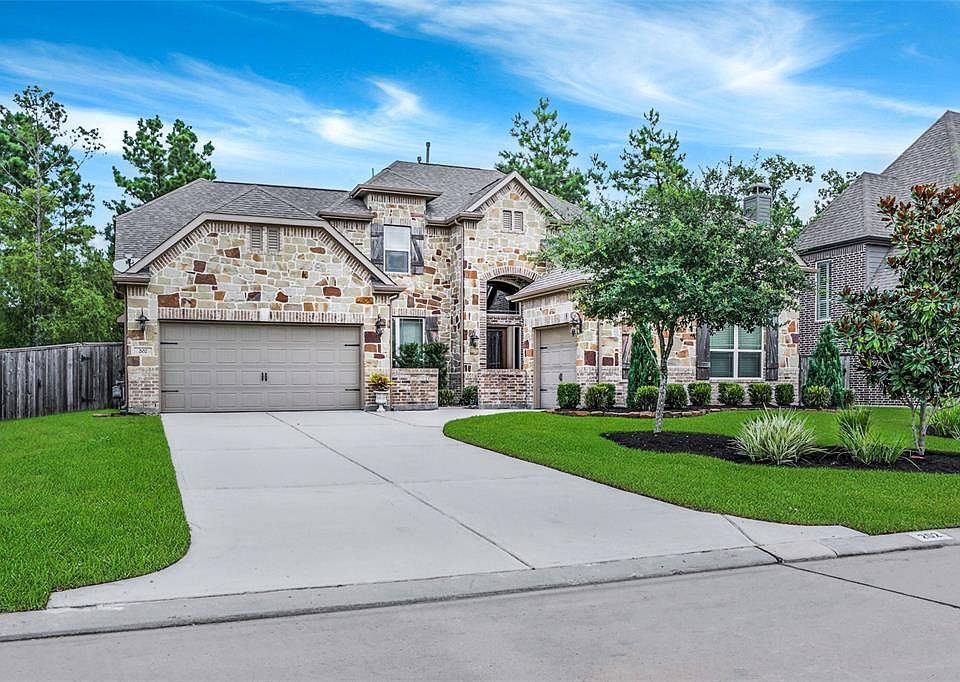 Stately and beautiful, highly desirable "Oakmont" plan built by Village Builders. 2 garages, with space for 3 cars.
