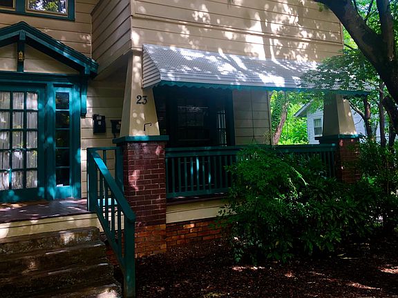 Unit is to the right of the main building door.