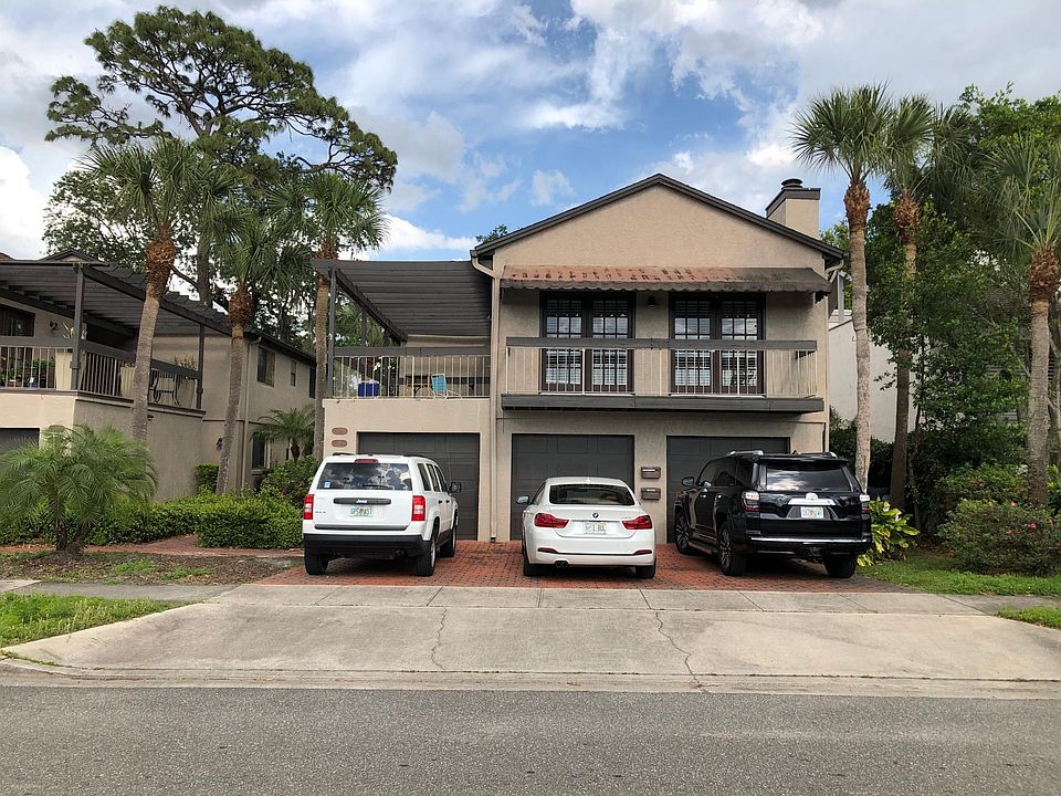 Front View, unit is upstairs. 2-car garage & driveway parking.