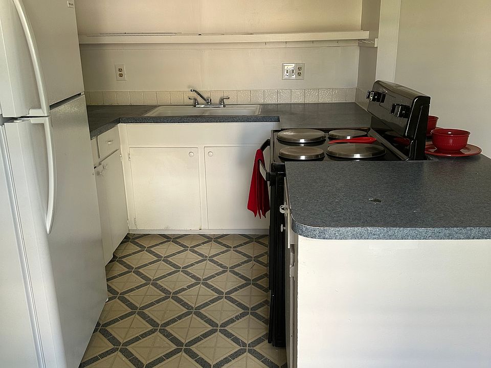 Kitchen: Electric stove and refrigerator included.