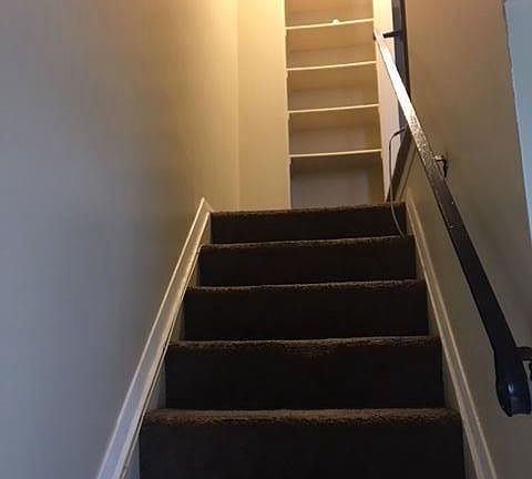 Steps and linen hall closet