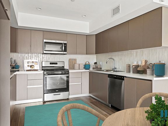 2nd image of 10405 Louisiana Ave #Penthouse 1