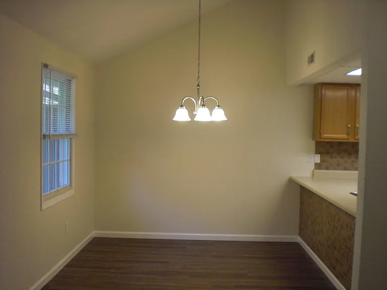 Dining area with vaulted ceiling
