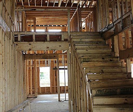 Sweeping staircase in the foyer.