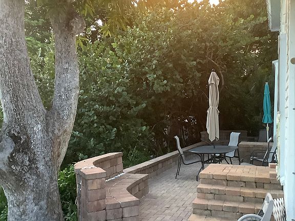 Stone deck on west side of main house.