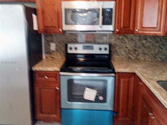 5th image of 8600 N Sherman Cir APT 106