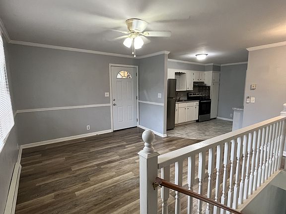 Front door, living & old kitchen.