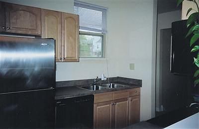 Galley kitchen with Stainless Steel appliances (inc. microwave & dishwasher)