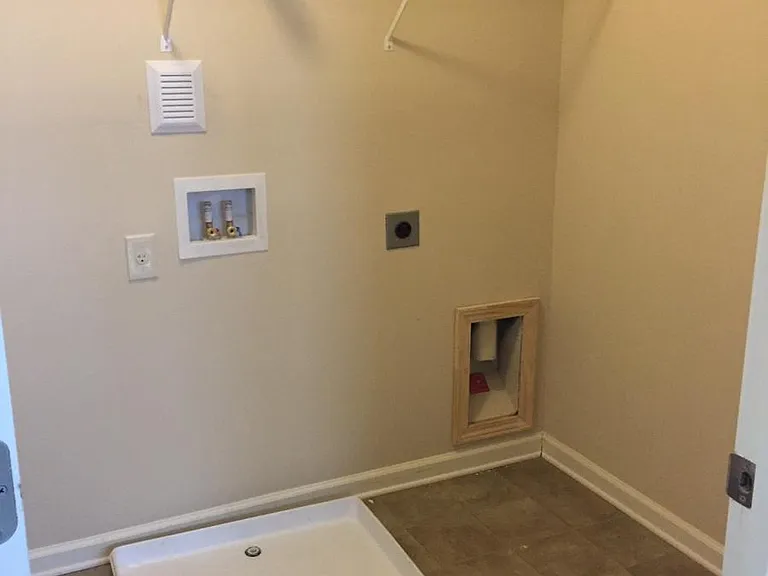 Laundry Room upstairs - includes storage