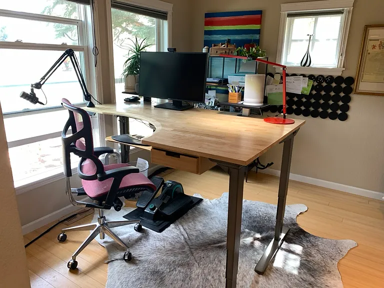 main floor office with adjustable height desk. monitor not included.
