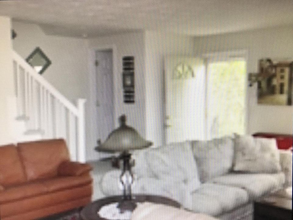 living room / front door / stairs