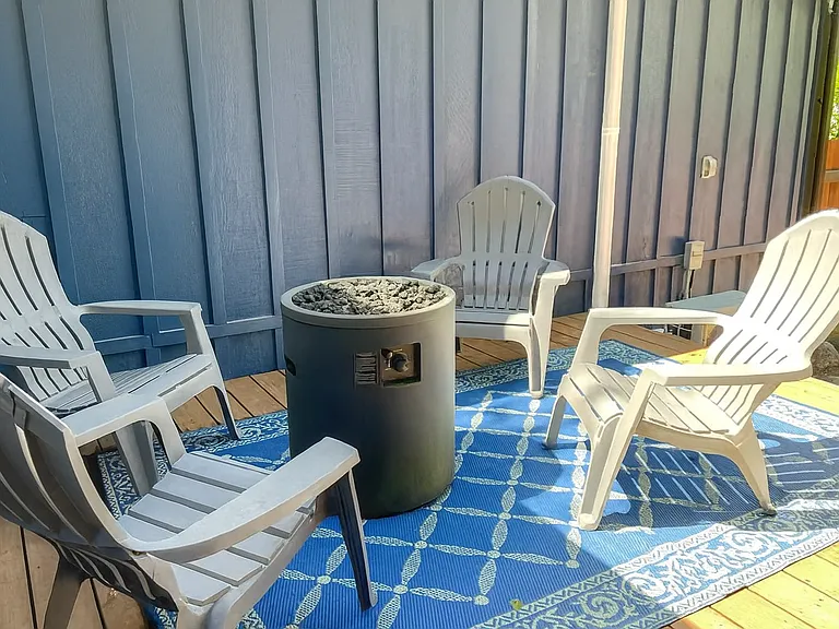 Gather 'round the fire_our private deck is perfect for s'mores, stories, and starry nights.